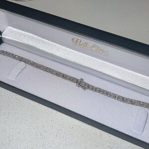 silver tennis bracelet.